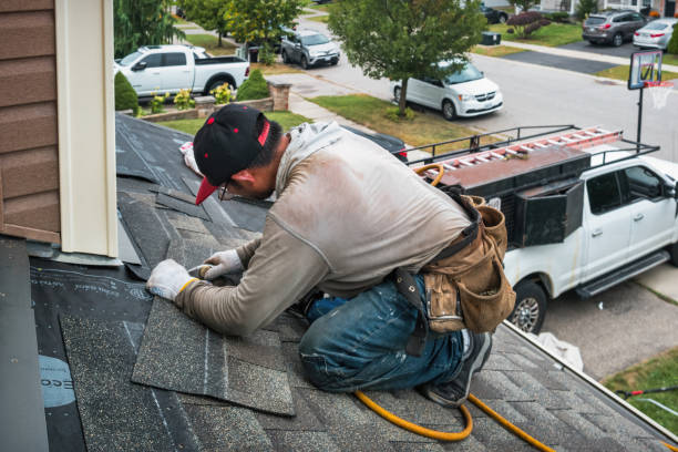 Professional Roofing technician working in London, WV
